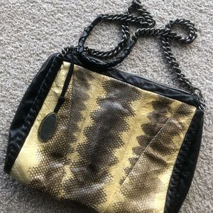 Elie Tahari snakeskin and leather cross body bag.